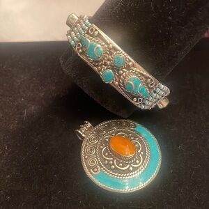 Tibetan silver with Tibetan turquoise and Amber. Bracelet and pendant set